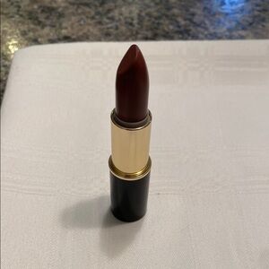 Elegant Red Lipstick with Gold Accents